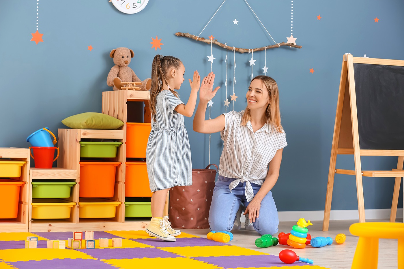 Children playing and learning together at Discovery School