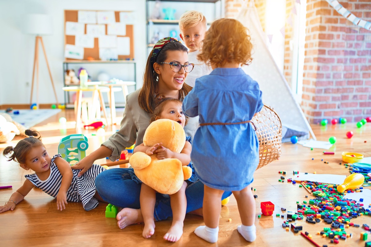 Toddlers exploring in the classroom