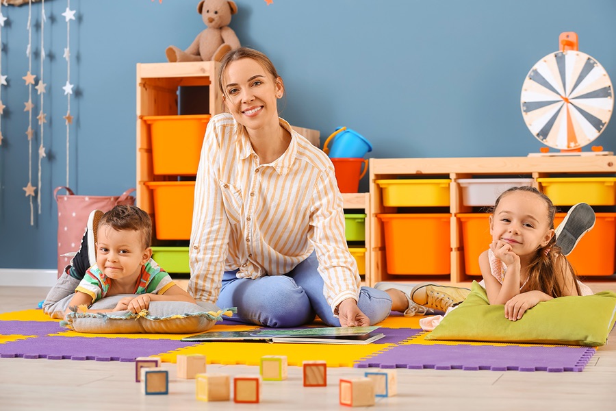 Teacher reading with children