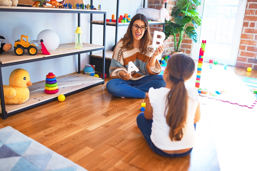 Child playing while learning
